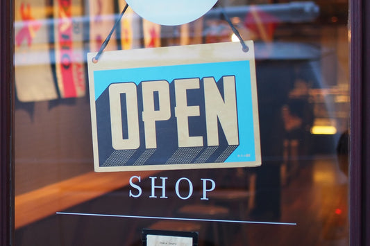 open sign on storefront