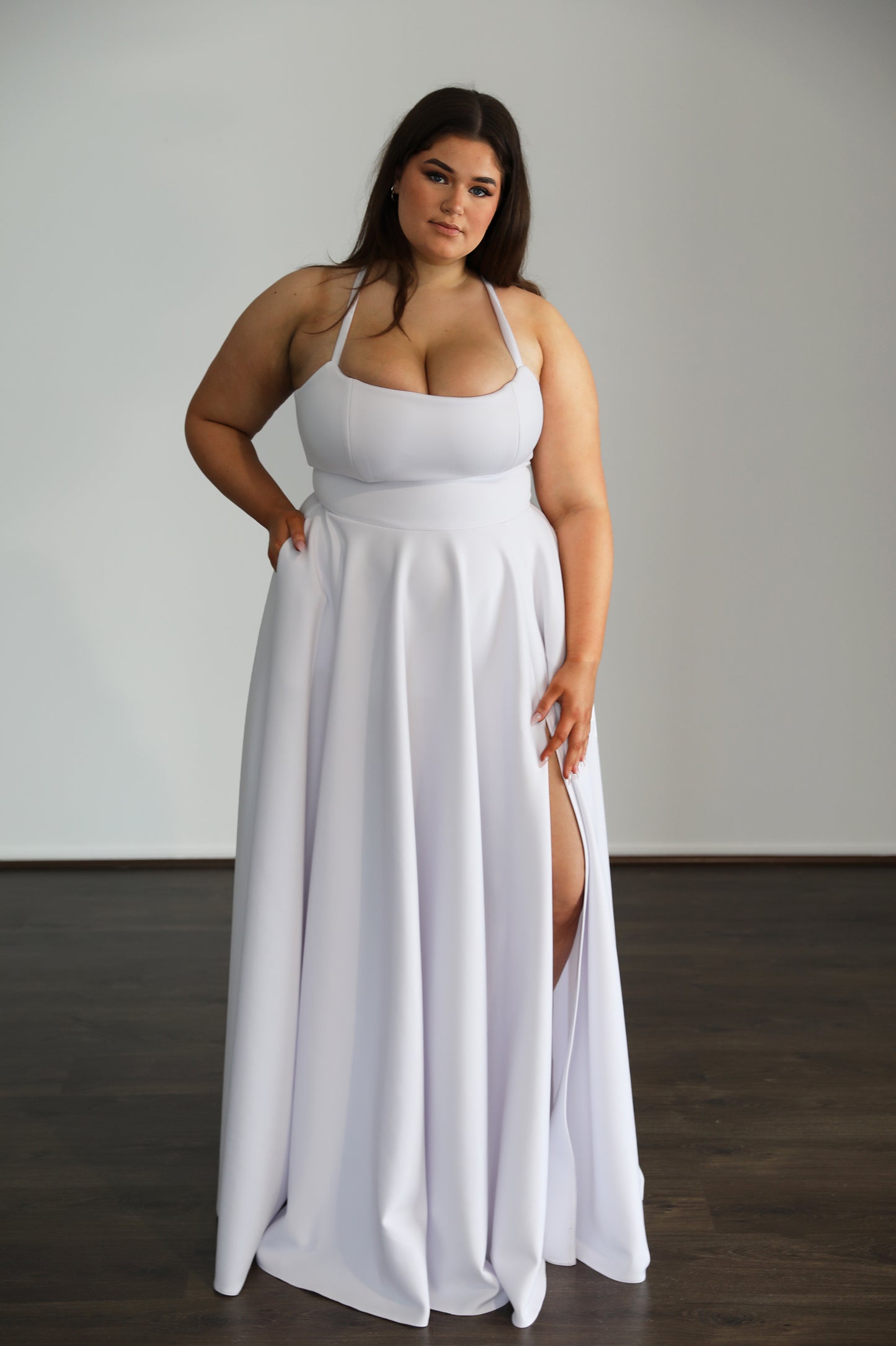 fitted top and flowing skirt on white formal dress