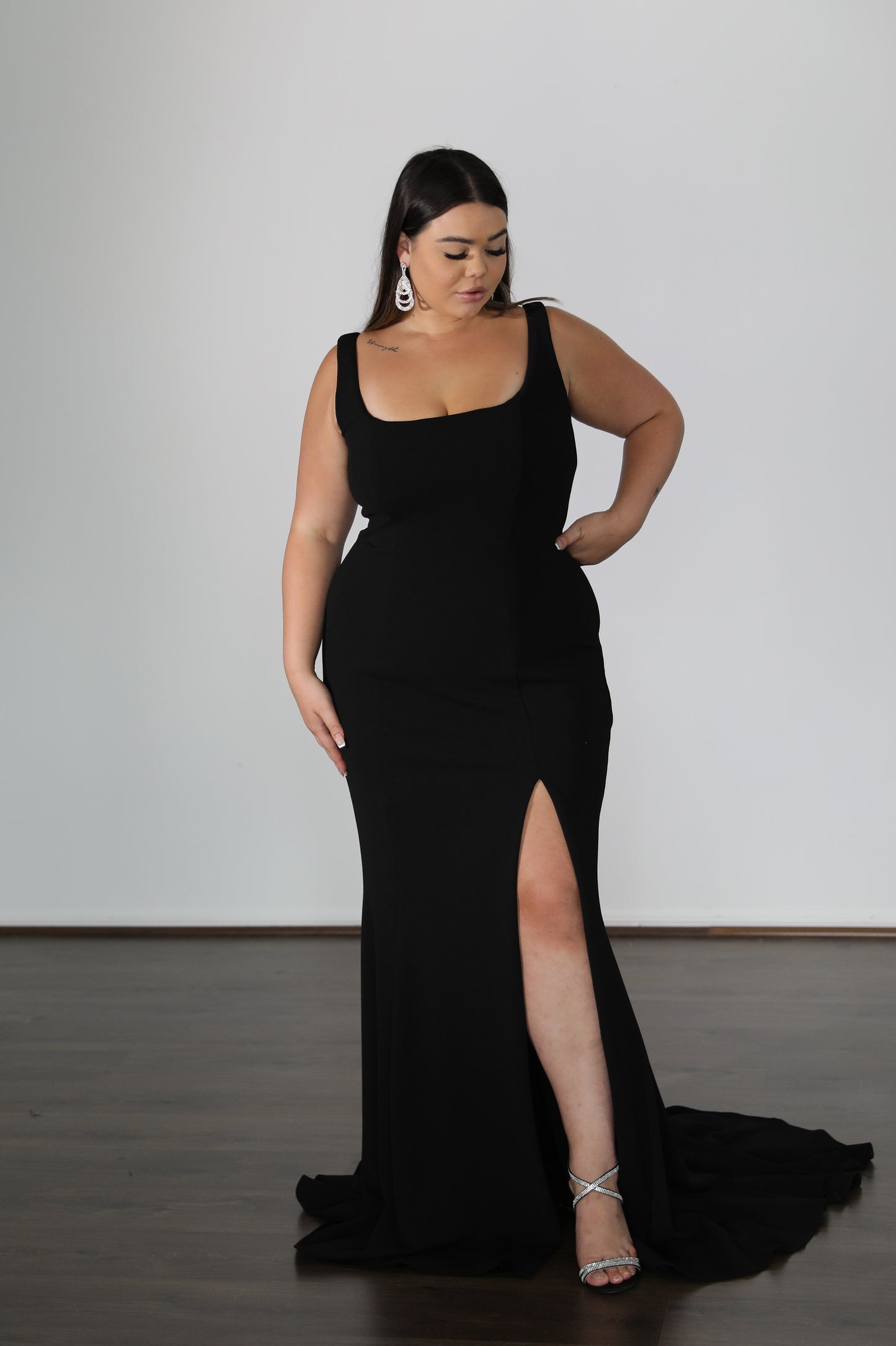 fitted train and thigh split on black formal dress