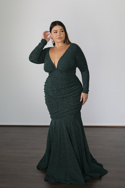 green formal dress with long sleeves