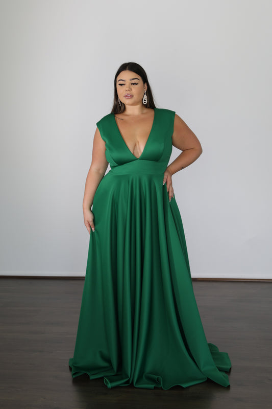 green formal dress with low v-cut neckline and full skirt