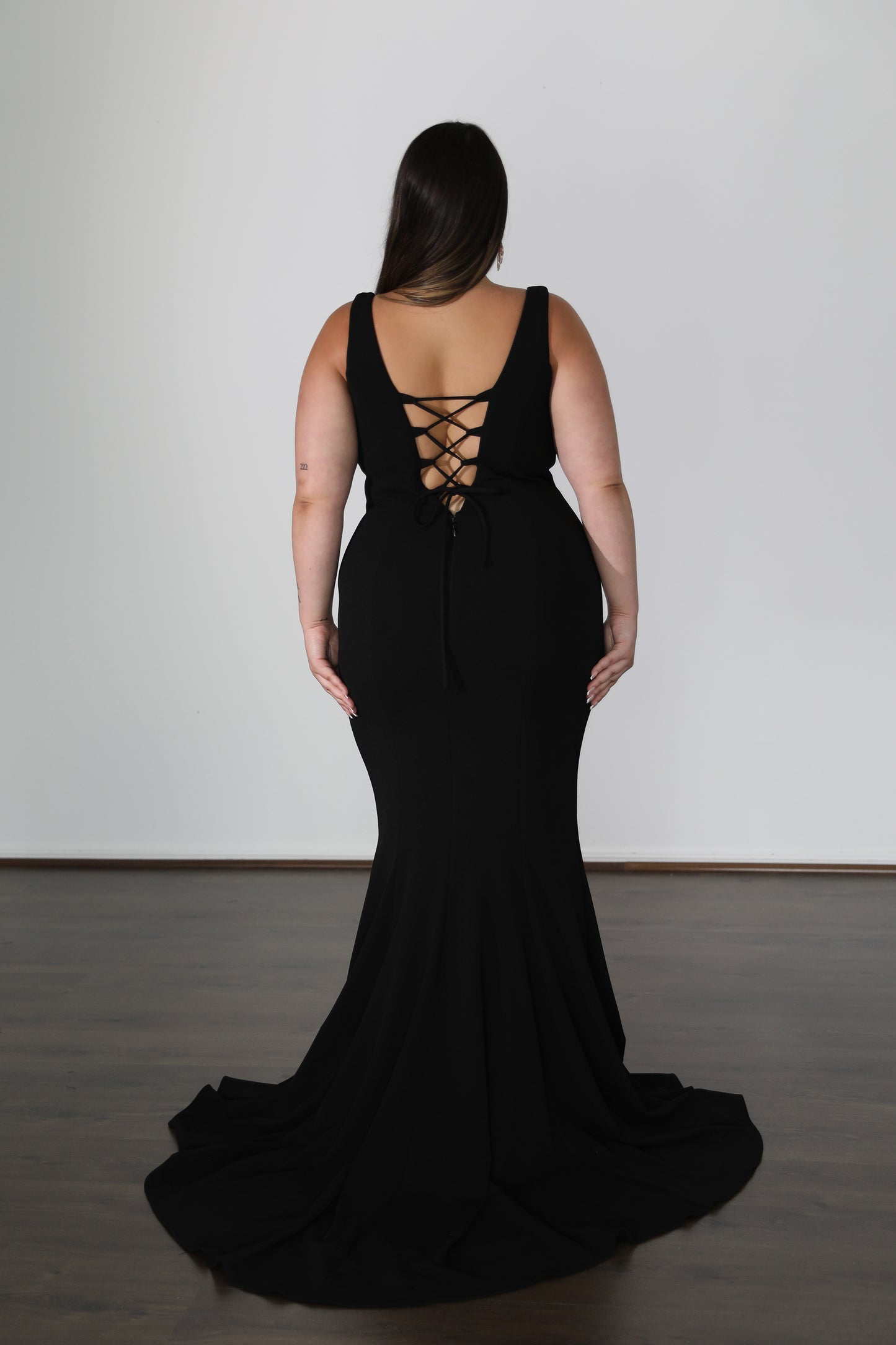 lace up back on black fitted mermaid formal gown