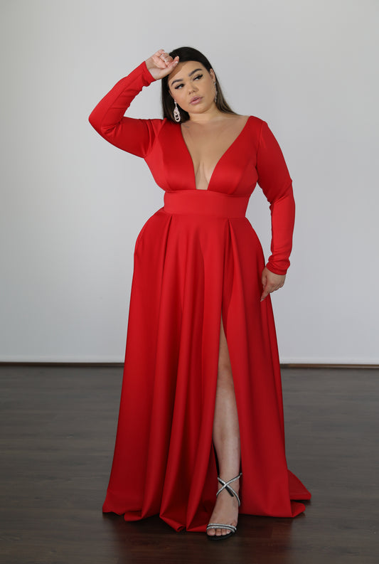 model wearing long sleeved red formal dress