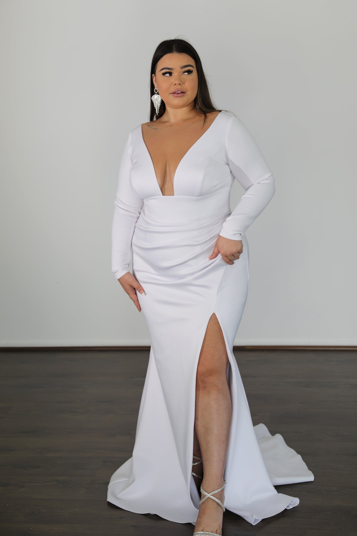 plus-size-model-in-white-formal-gown