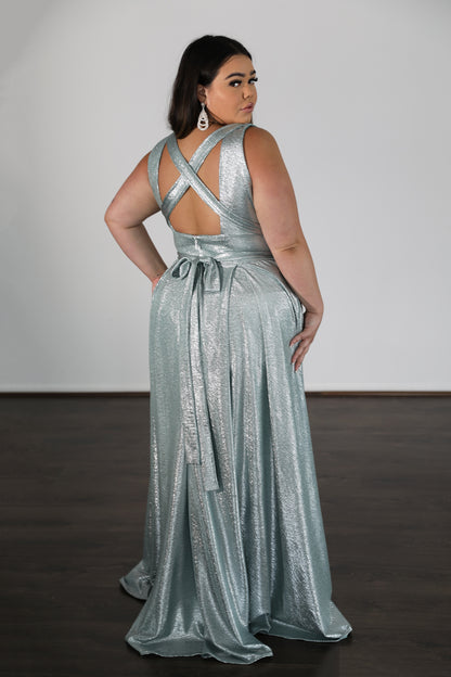 seafoam formal gown with flowing skirt and cross back tie up