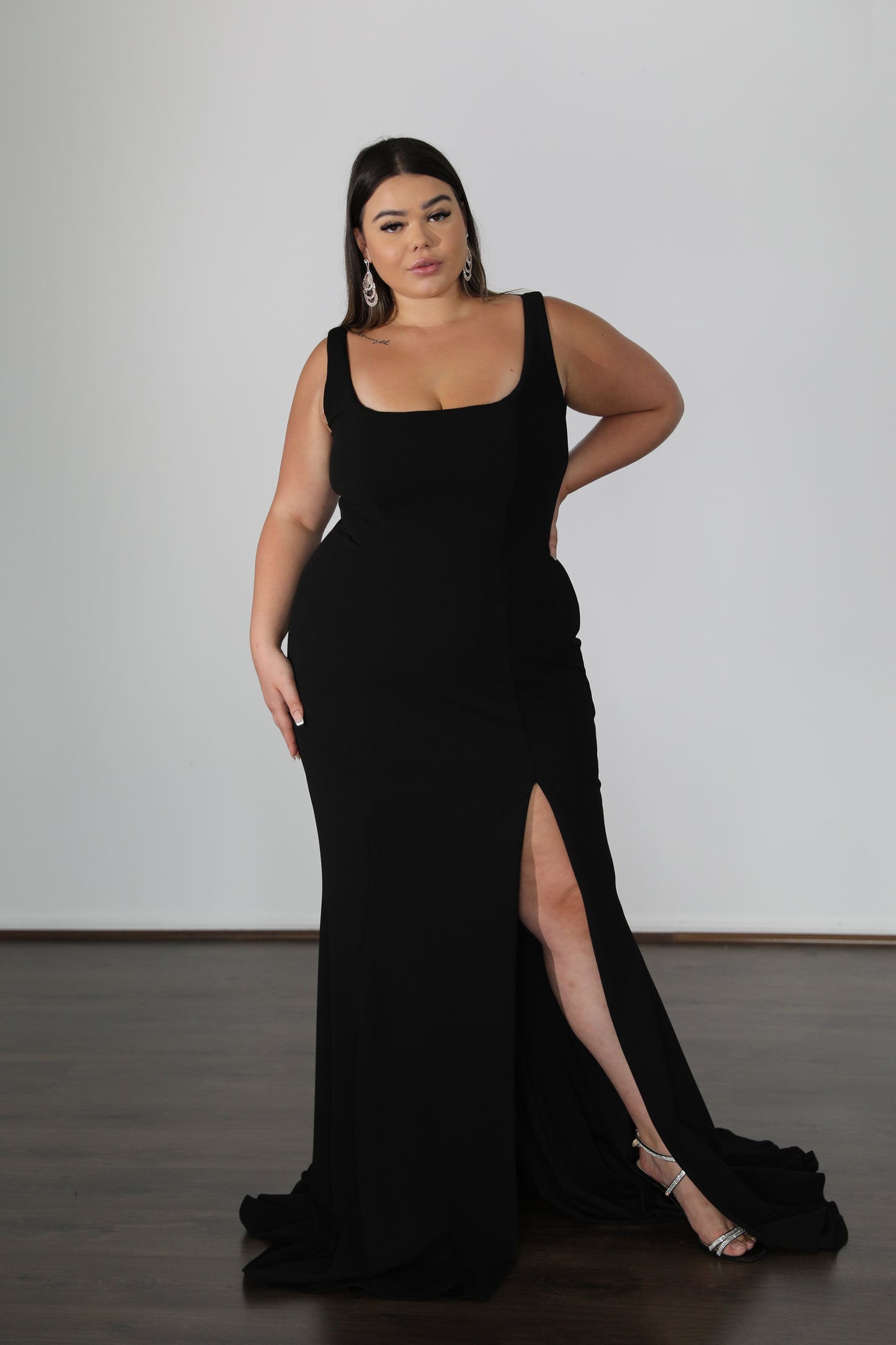 thigh high split on black u-neck formal dress