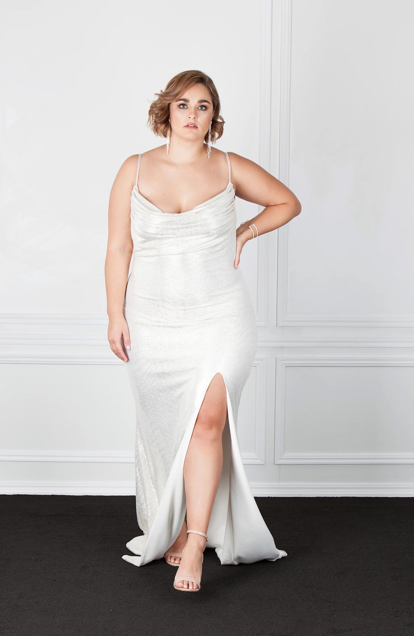 white formal dress on plus size woman